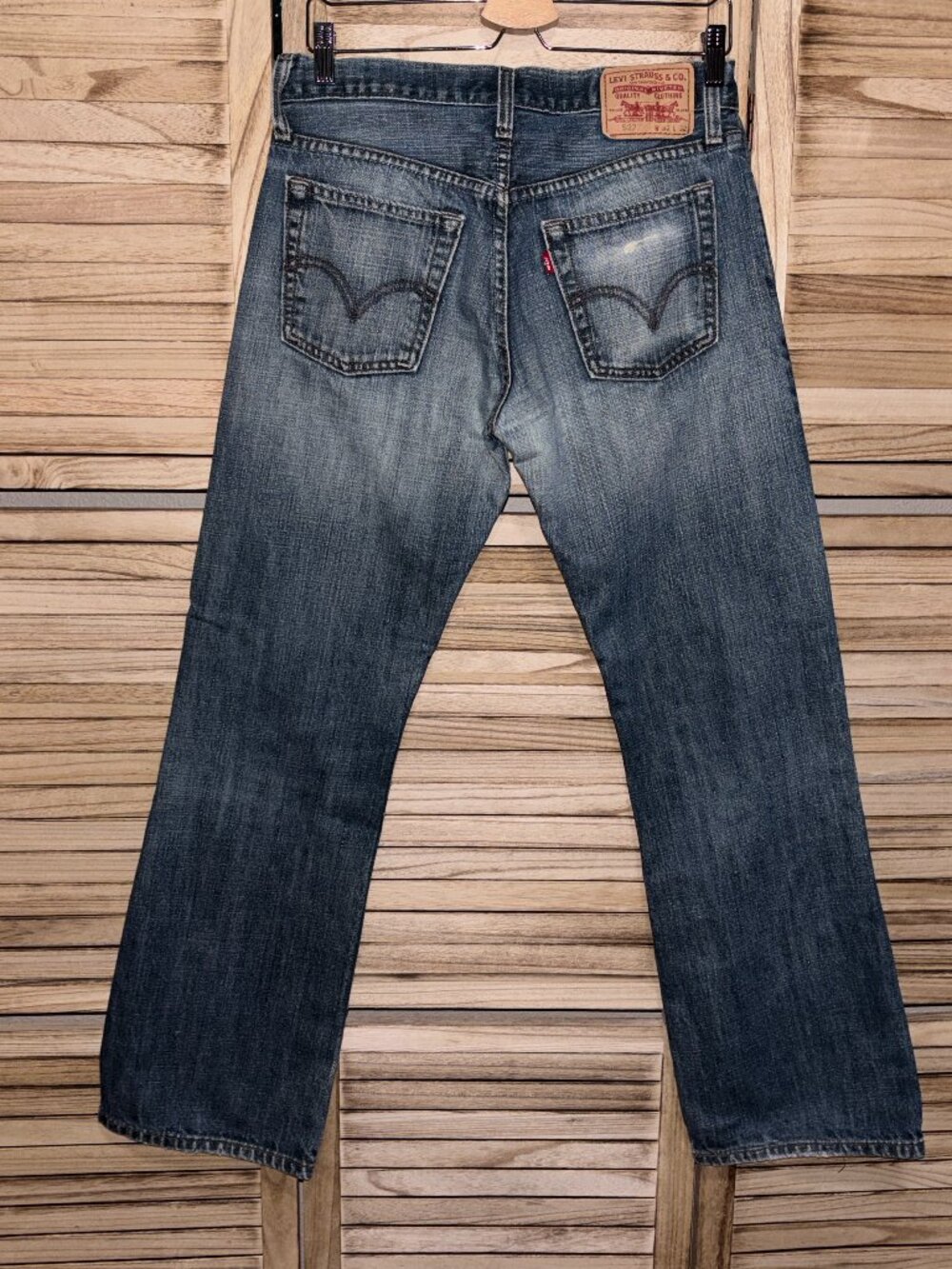 Vintage Levi's 527 Low Boot Cut Jeans 32x32 Medium Wash Distressed Denim